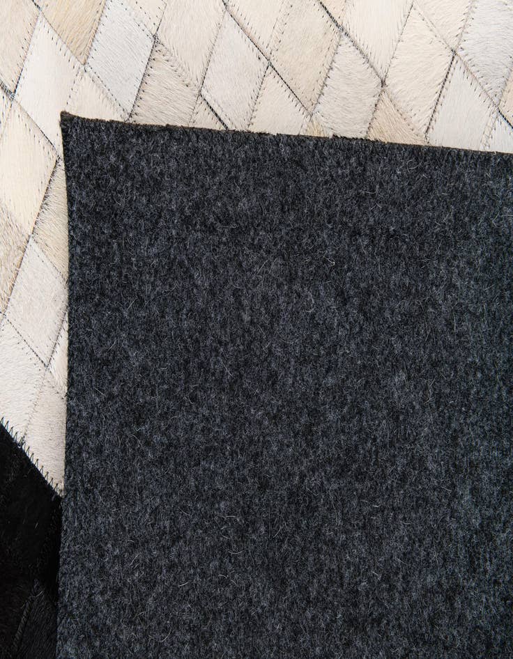 Detail image of  5' x 8' 1 Cowhide Stocks Rug