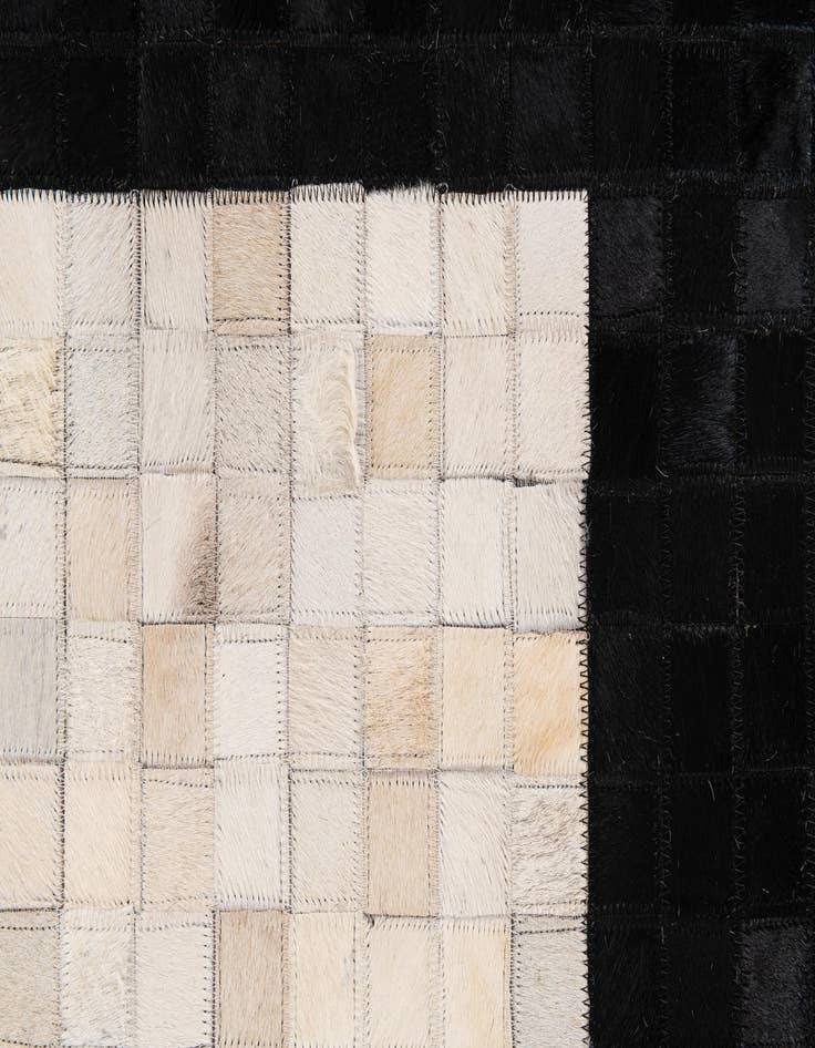 Detail image of  5' x 7' 11 Cowhide Stocks Rug