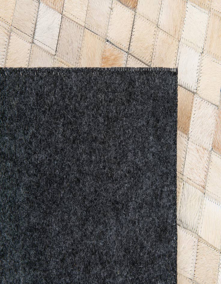 Detail image of  5' 2 x 8' Cowhide Stocks Rug