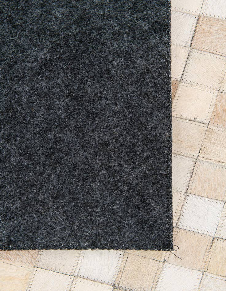 Detail image of  5' x 7' 11 Cowhide Stocks Rug