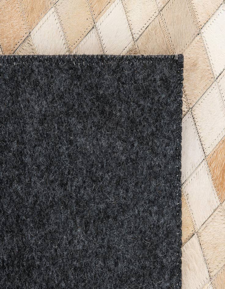 Detail image of  5' 2 x 7' 11 Cowhide Stocks Rug