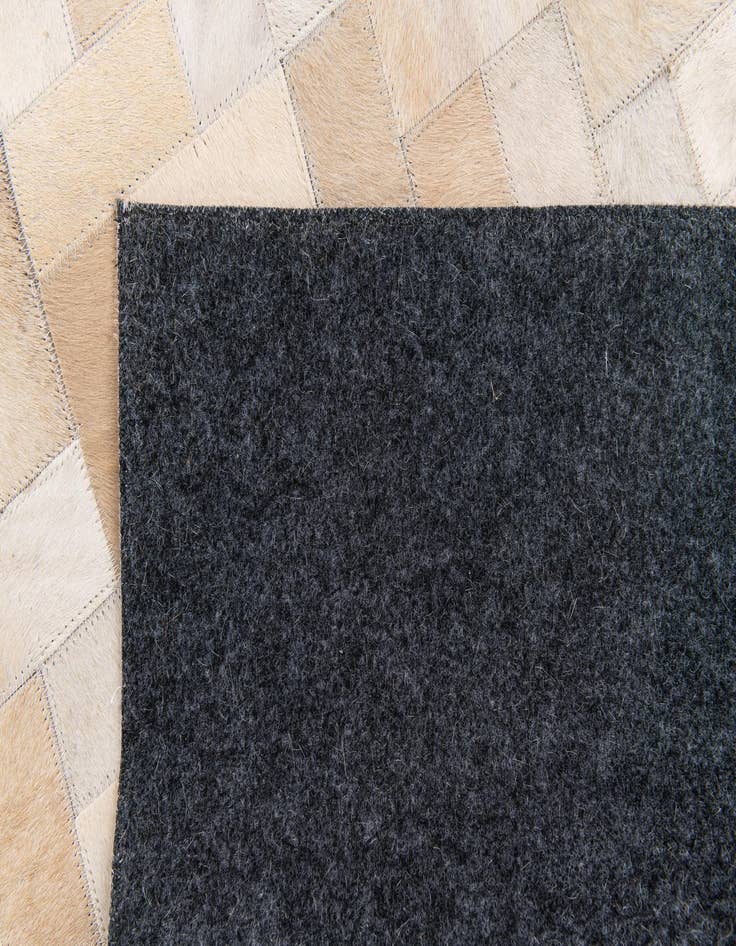 Detail image of  5' x 7' 11 Cowhide Stocks Rug