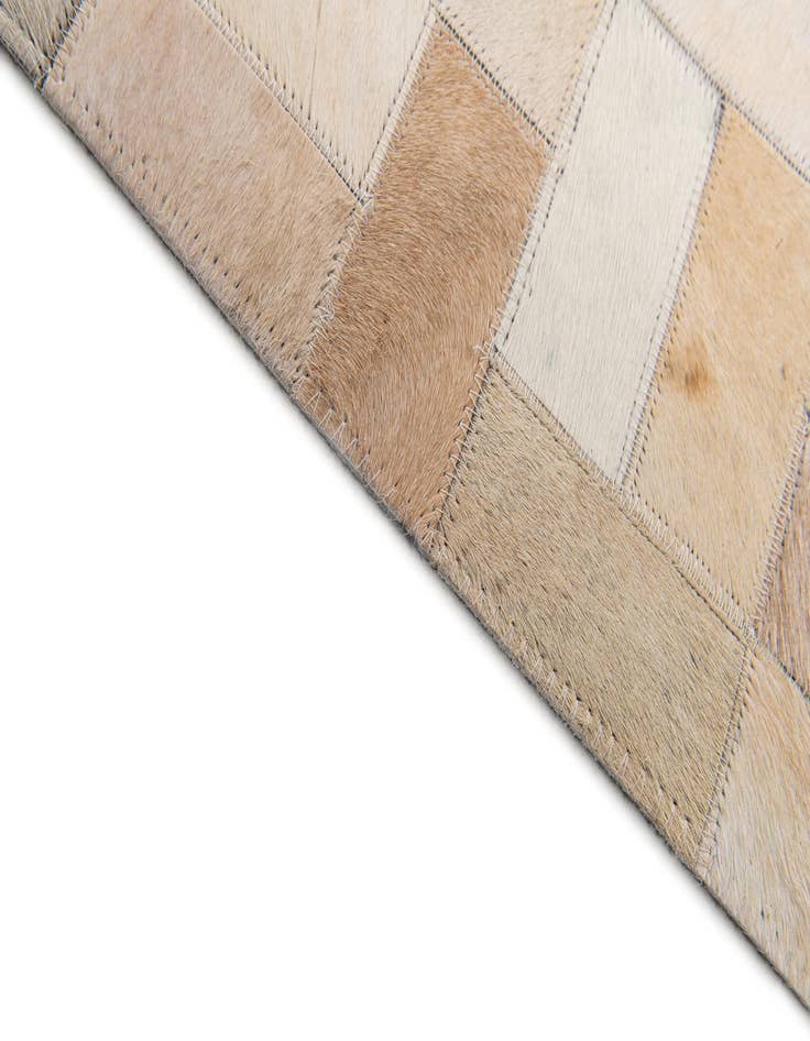 Detail image of  5' x 7' 11 Cowhide Stocks Rug