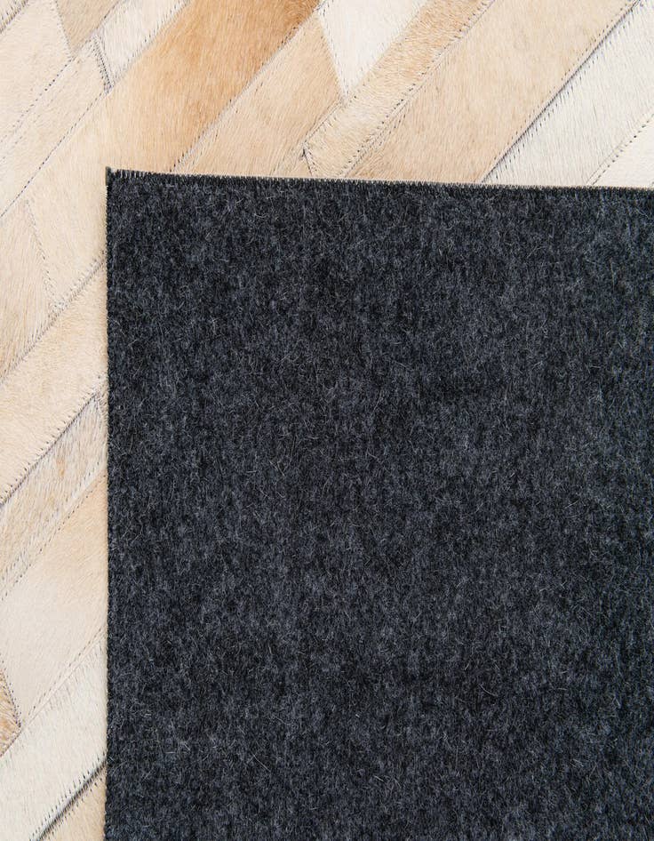 Detail image of  5' x 8' Cowhide Stocks Rug