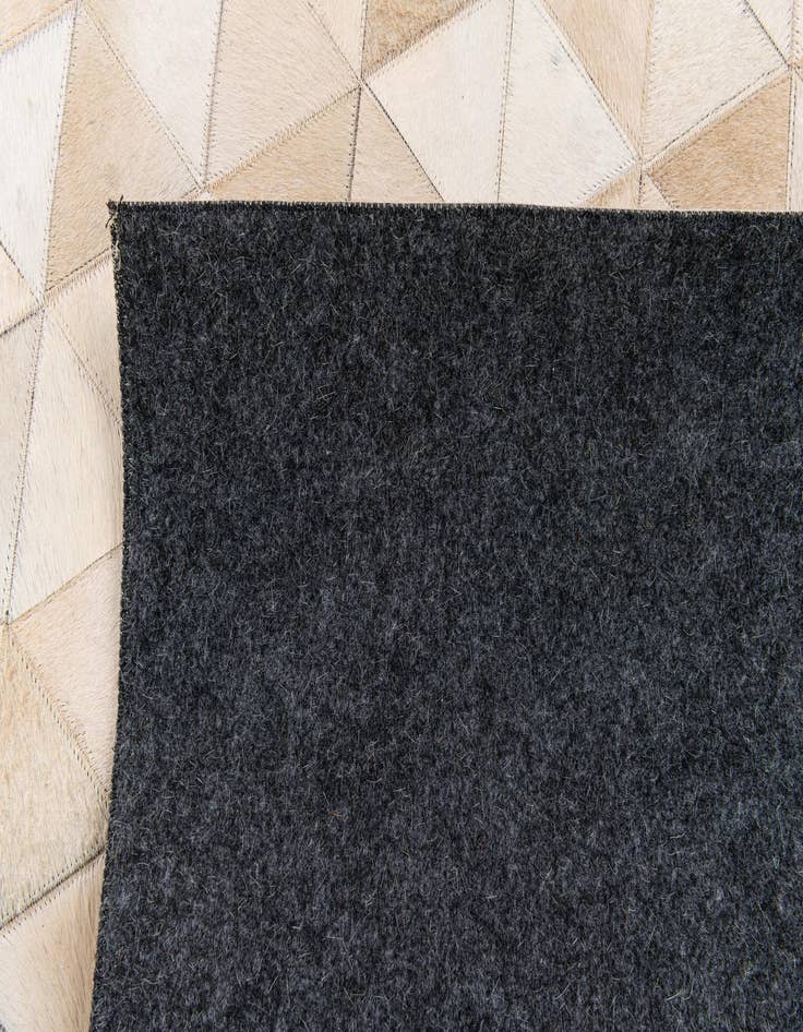 Detail image of  5' 1 x 8' 1 Cowhide Stocks Rug