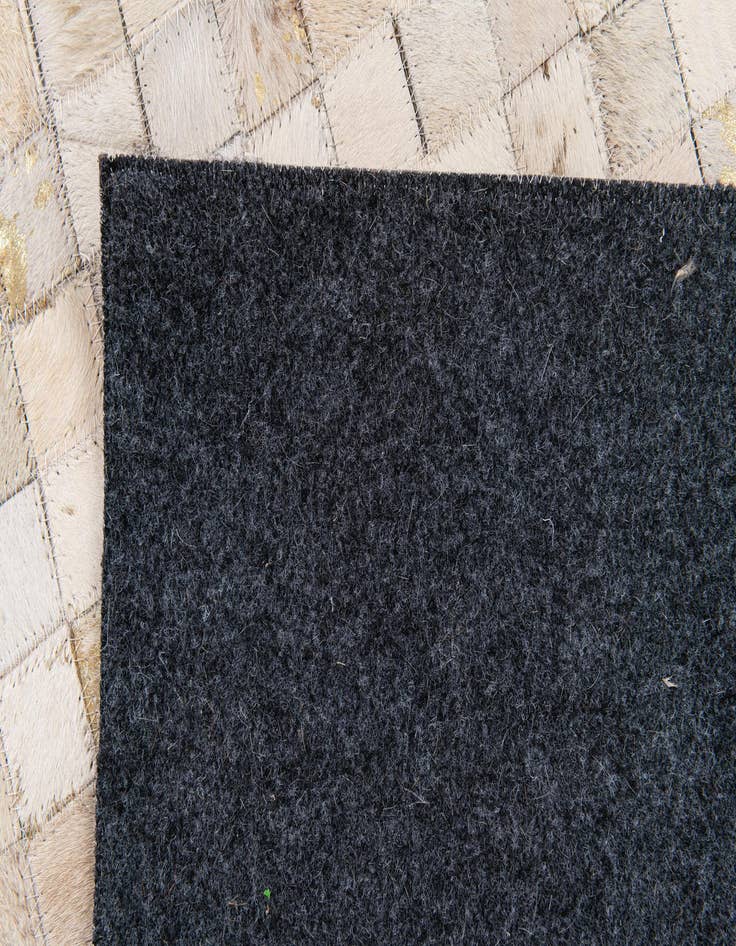 Detail image of  5' 4 x 7' 5 Cowhide Stocks Rug