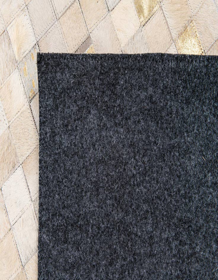 Detail image of  5' 3 x 7' 6 Cowhide Stocks Rug