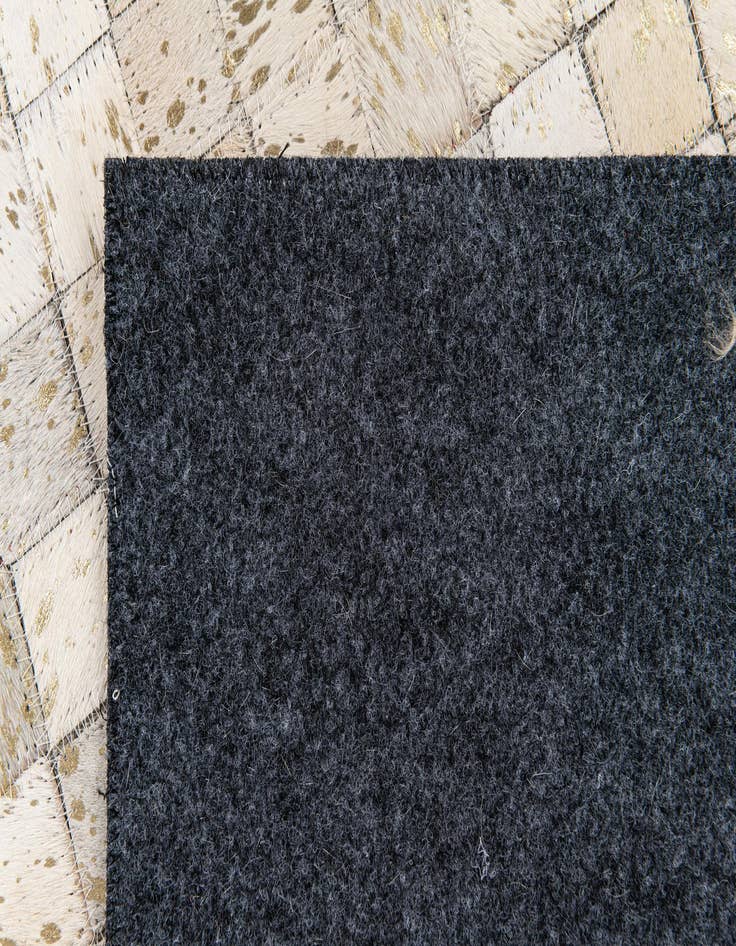 Detail image of  5' 3 x 7' 6 Cowhide Stocks Rug