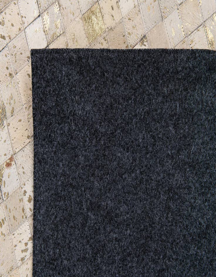 Detail image of  5' 3 x 7' 5 Cowhide Stocks Rug