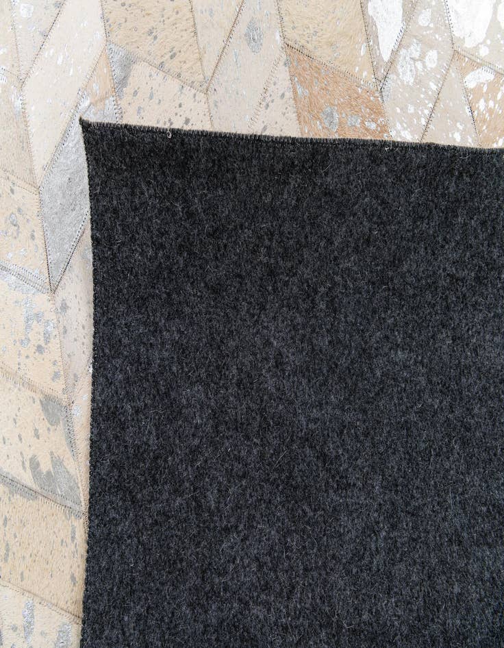 Detail image of  4' 11 x 7' 11 Cowhide Stocks Rug