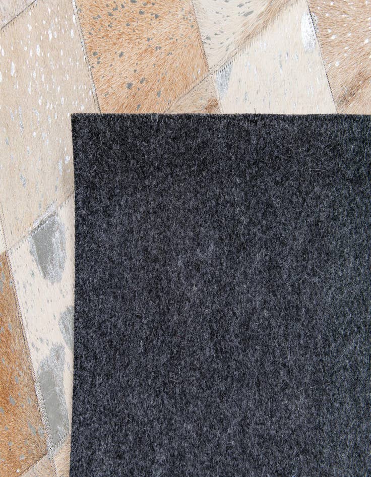 Detail image of  5' 2 x 8' 1 Cowhide Stocks Rug