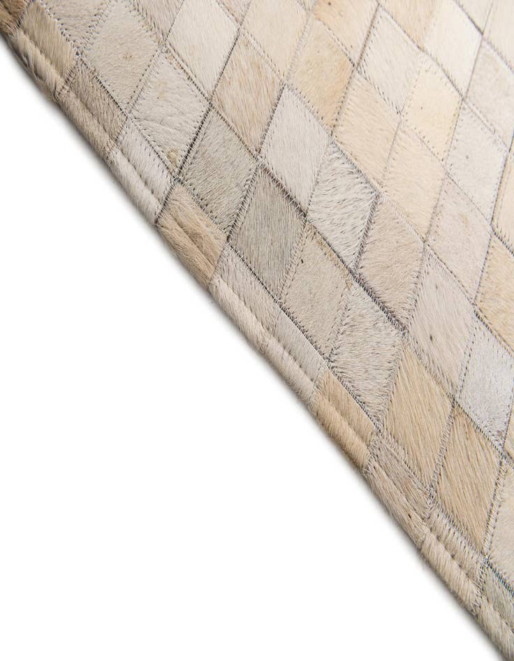 Detail image of  5' 3 x 7' 5 Cowhide Stocks Rug