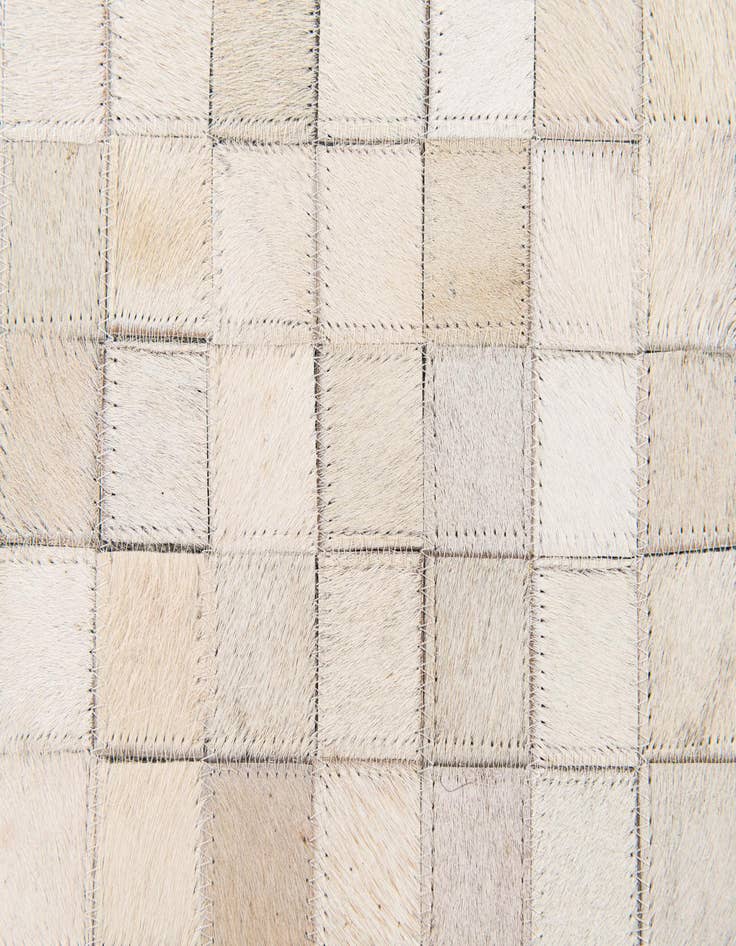 Detail image of  5' 3 x 7' 5 Cowhide Stocks Rug