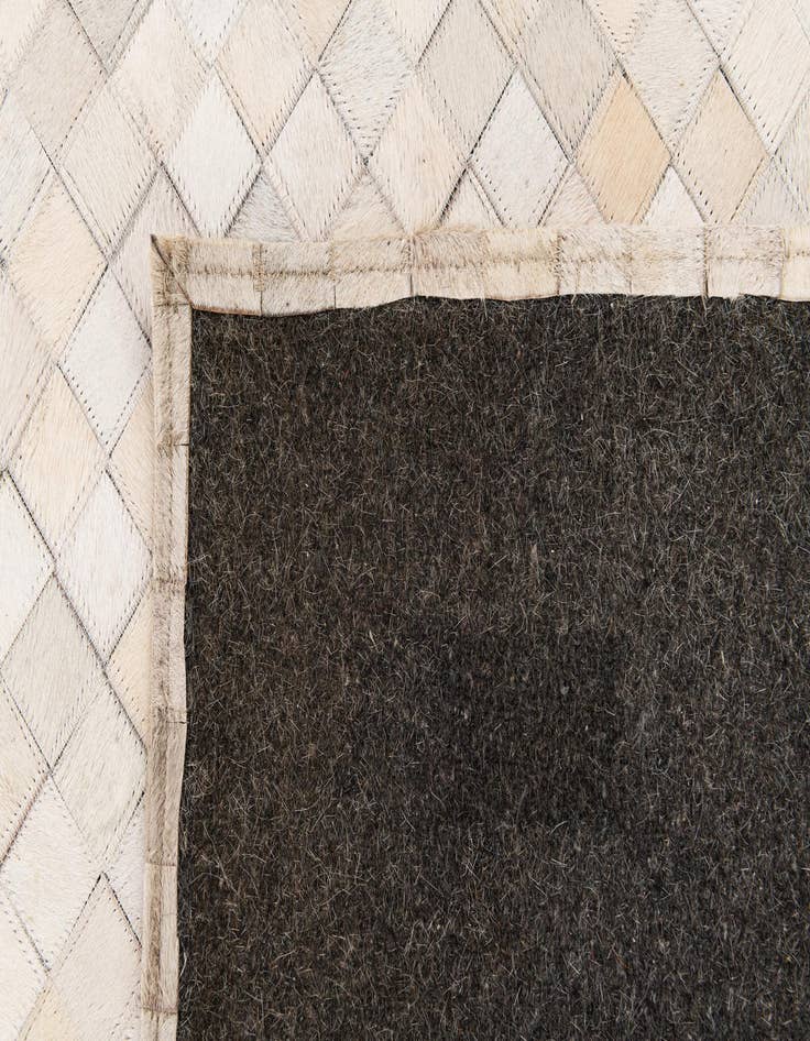 Detail image of  5' 3 x 7' 5 Cowhide Stocks Rug