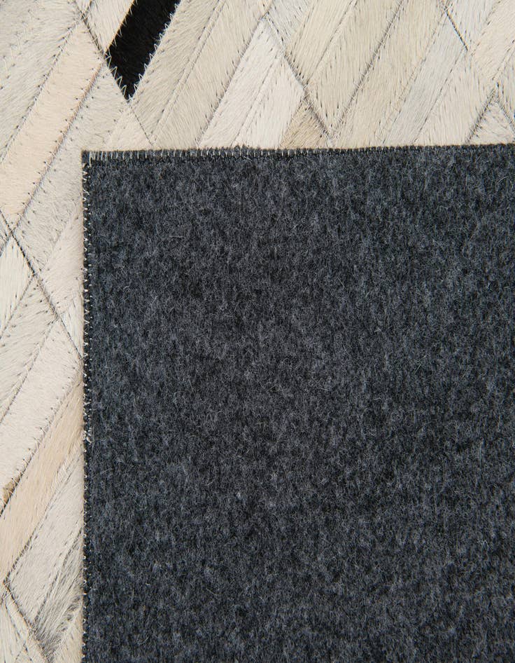 Detail image of  6' x 9' Cowhide Stocks Rug