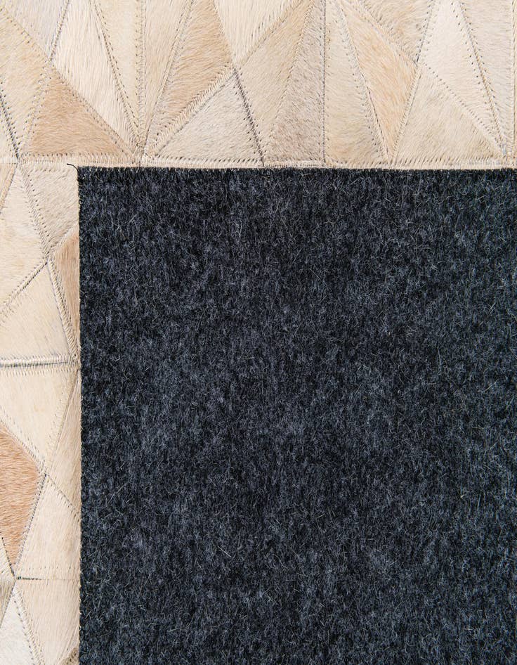 Detail image of  6' 8 x 9' 8 Cowhide Stocks Rug