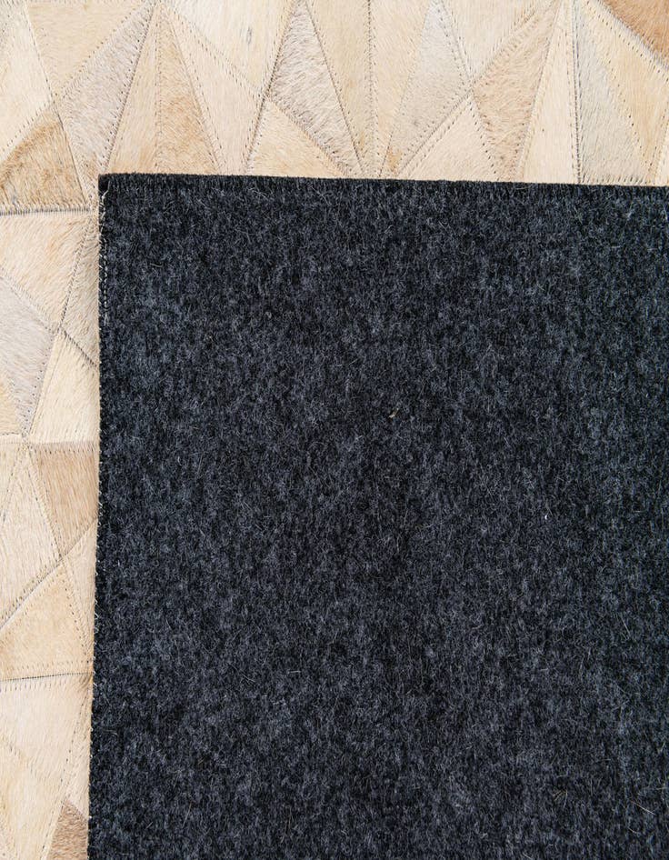 Detail image of  4' 9 x 6' 6 Cowhide Stocks Rug
