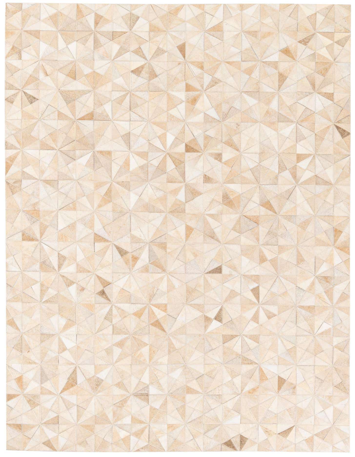 A 5x7 rectangular ivory cowhide rug with a modern geometric pattern of stitched triangular patches.