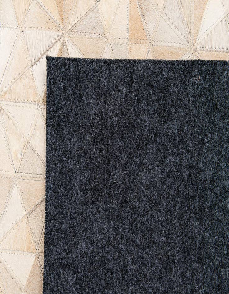 Detail image of  4' 8 x 6' 7 Cowhide Stocks Rug