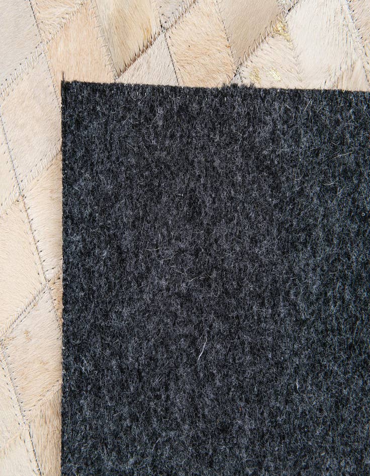 Detail image of  4' 1 x 5' 7 Cowhide Stocks Rug
