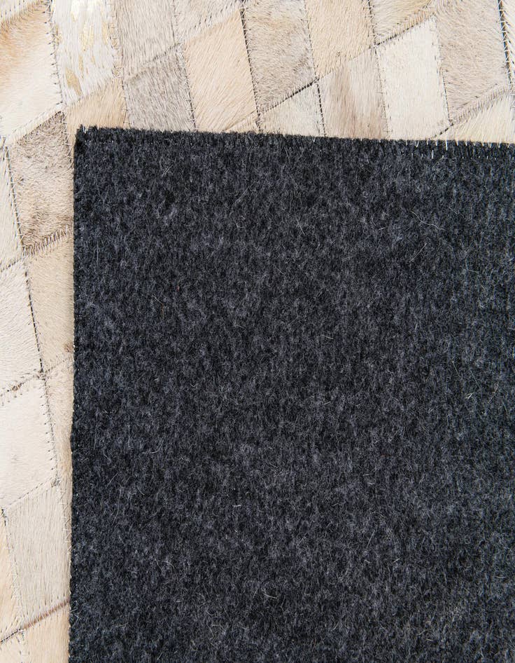 Detail image of  4' 1 x 5' 8 Cowhide Stocks Rug