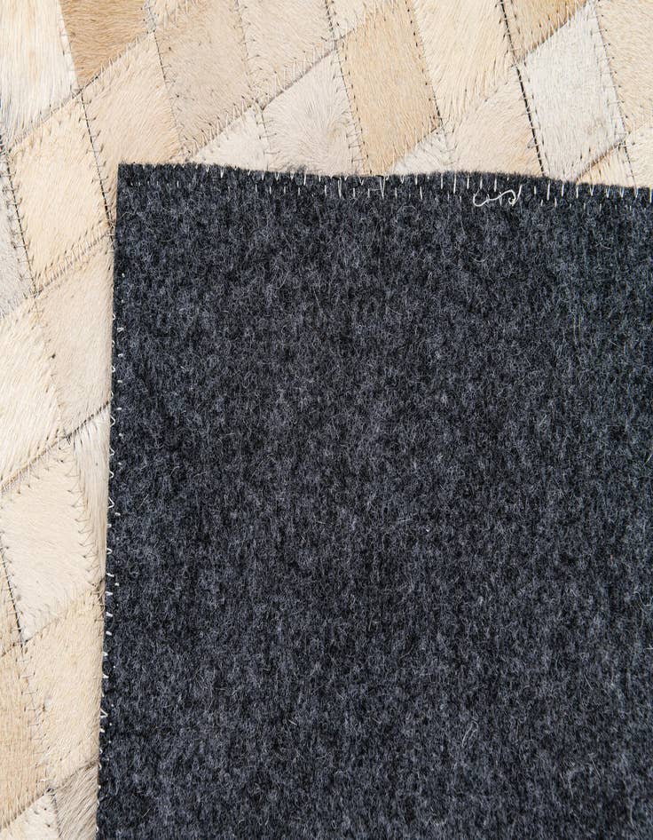 Detail image of  4' 1 x 5' 8 Cowhide Stocks Rug