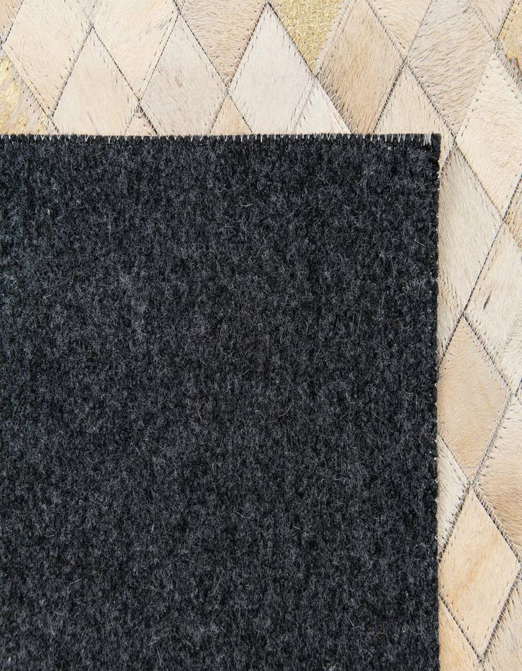 Detail image of  4' 1 x 5' 8 Cowhide Stocks Rug