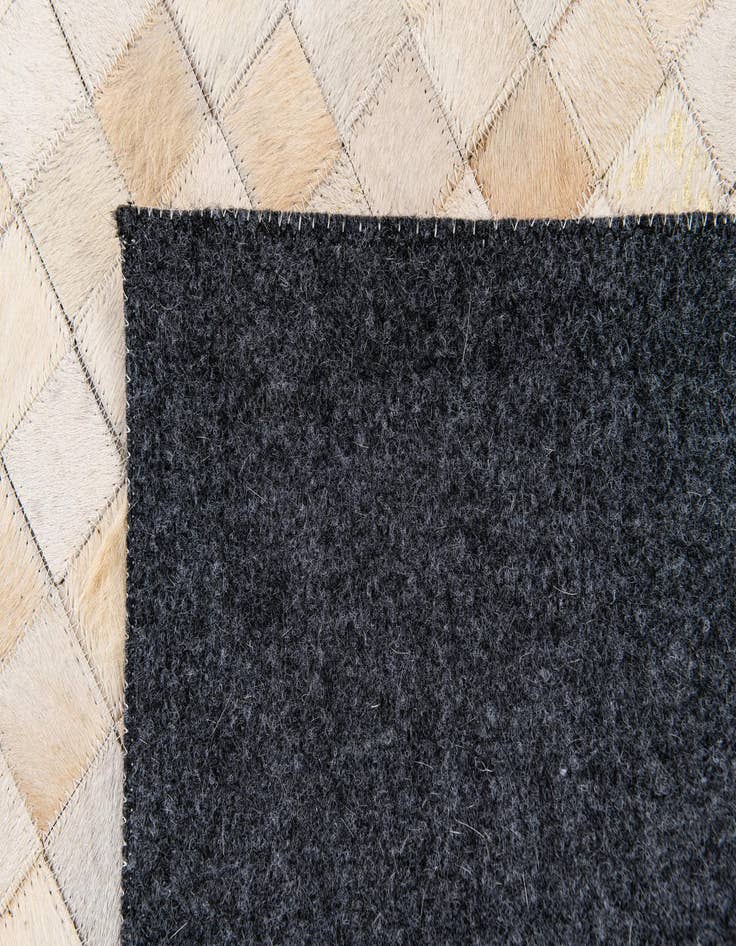 Detail image of  4' x 5' 7 Cowhide Stocks Rug