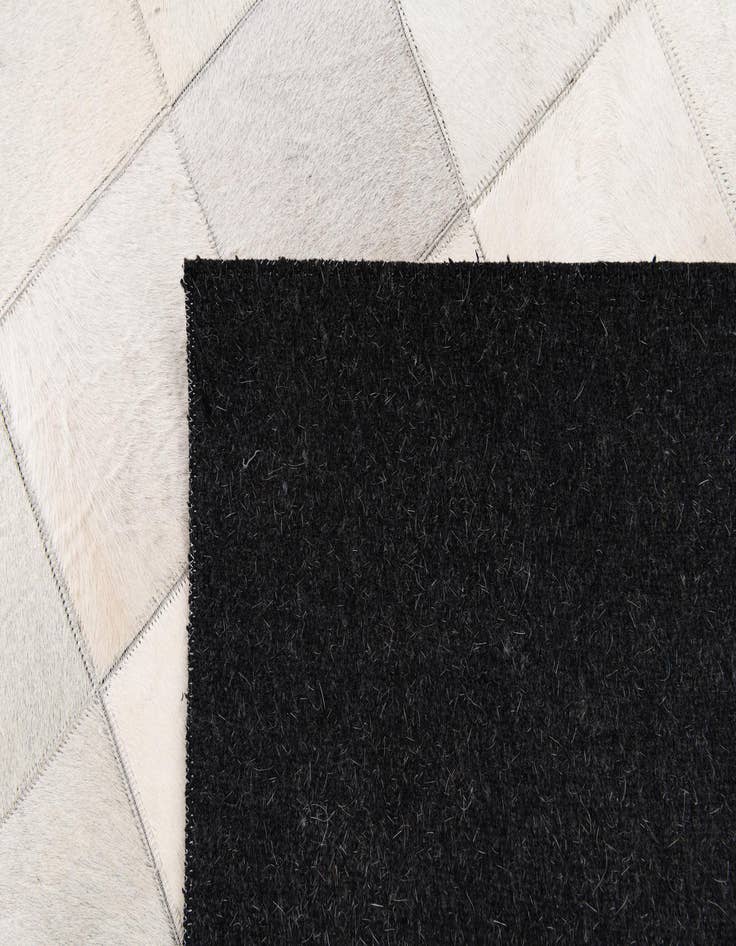 Detail image of  4' x 5' 11 Cowhide Stocks Rug