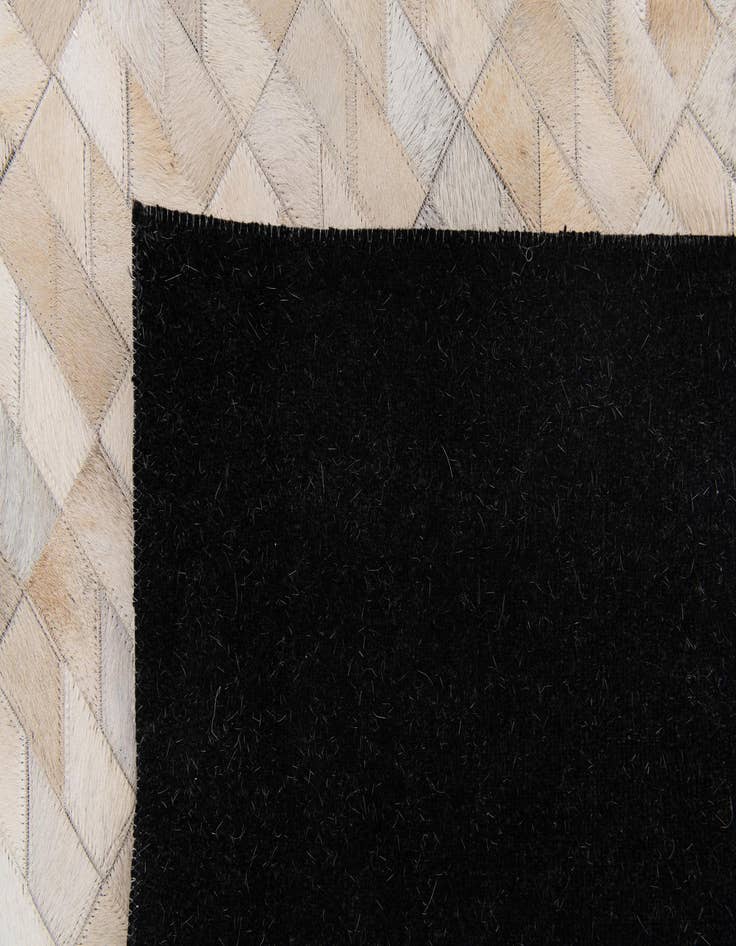 Detail image of  4' 5 x 5' 2 Cowhide Stocks Rug