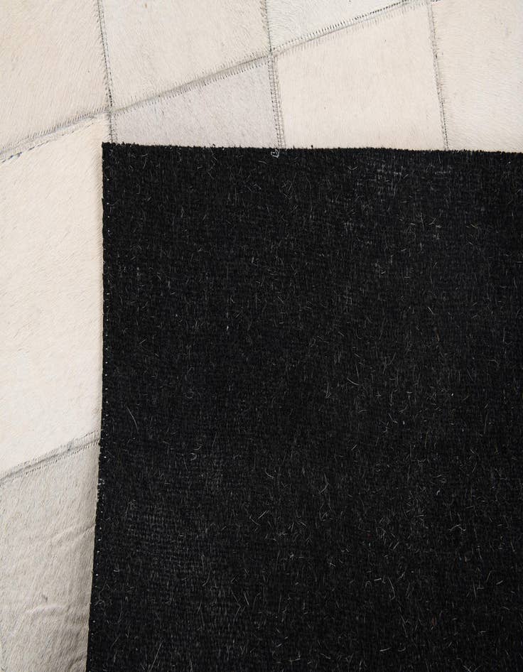 Detail image of  4' x 5' 10 Cowhide Stocks Rug