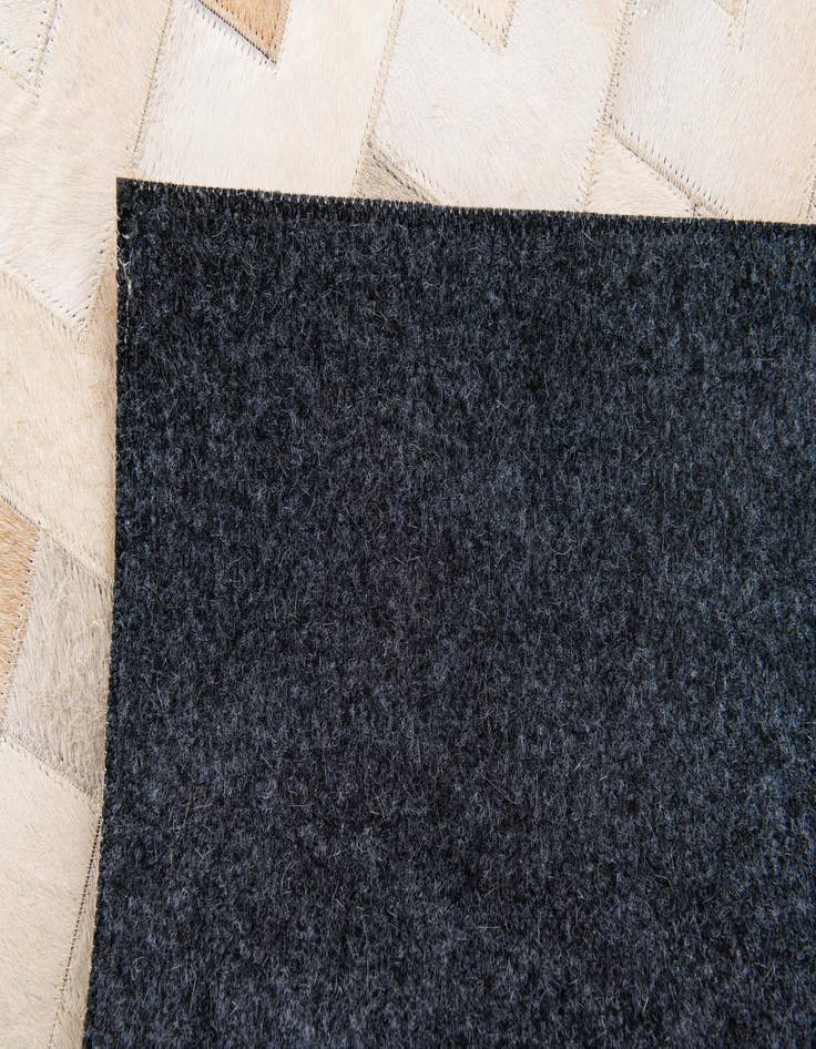 Detail image of  4' 1 x 6' Cowhide Stocks Rug
