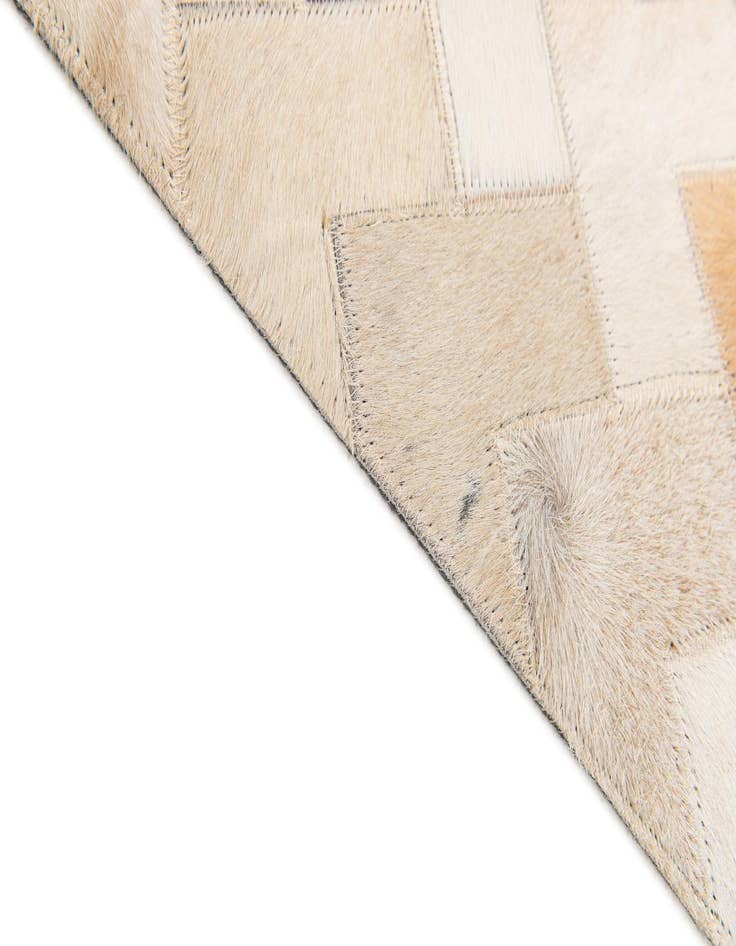 Detail image of  3' 9 x 5' 10 Cowhide Stocks Rug