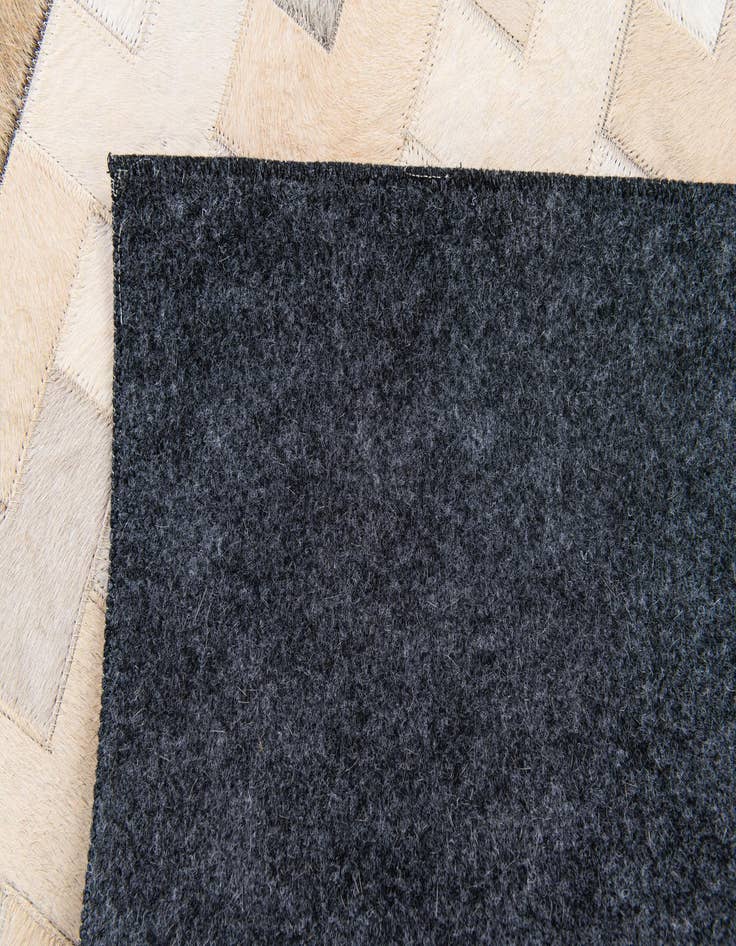 Detail image of  3' 9 x 5' 10 Cowhide Stocks Rug