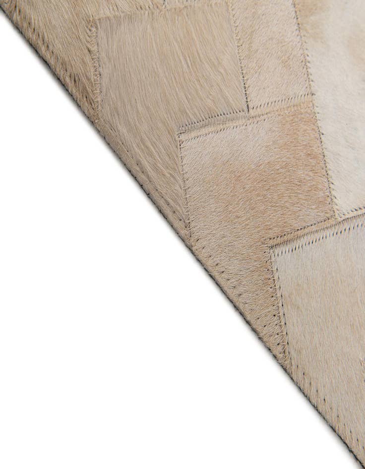 Detail image of  4' 2 x 5' 11 Cowhide Stocks Rug