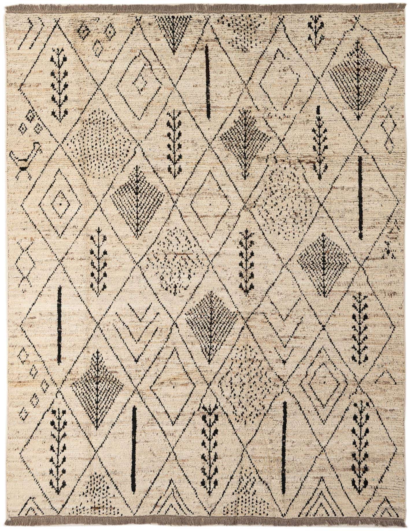 A 6x9 rectangular ivory wool rug with a modern geometric pattern of black diamonds, lines, and leaf-like motifs.