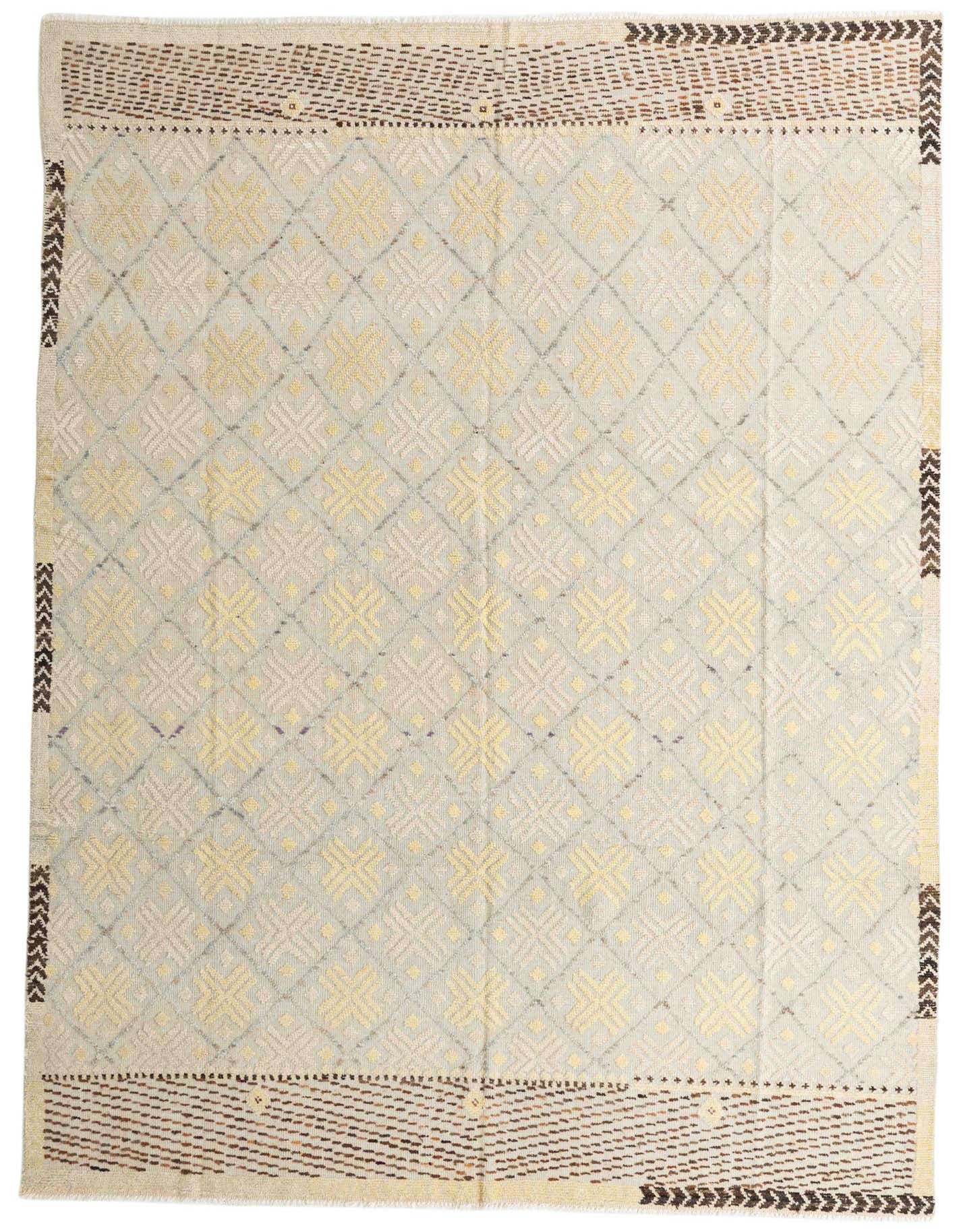 A 9x12 rectangular ivory wool rug with a modern abstract pattern and dark brown borders, suitable for a living room.