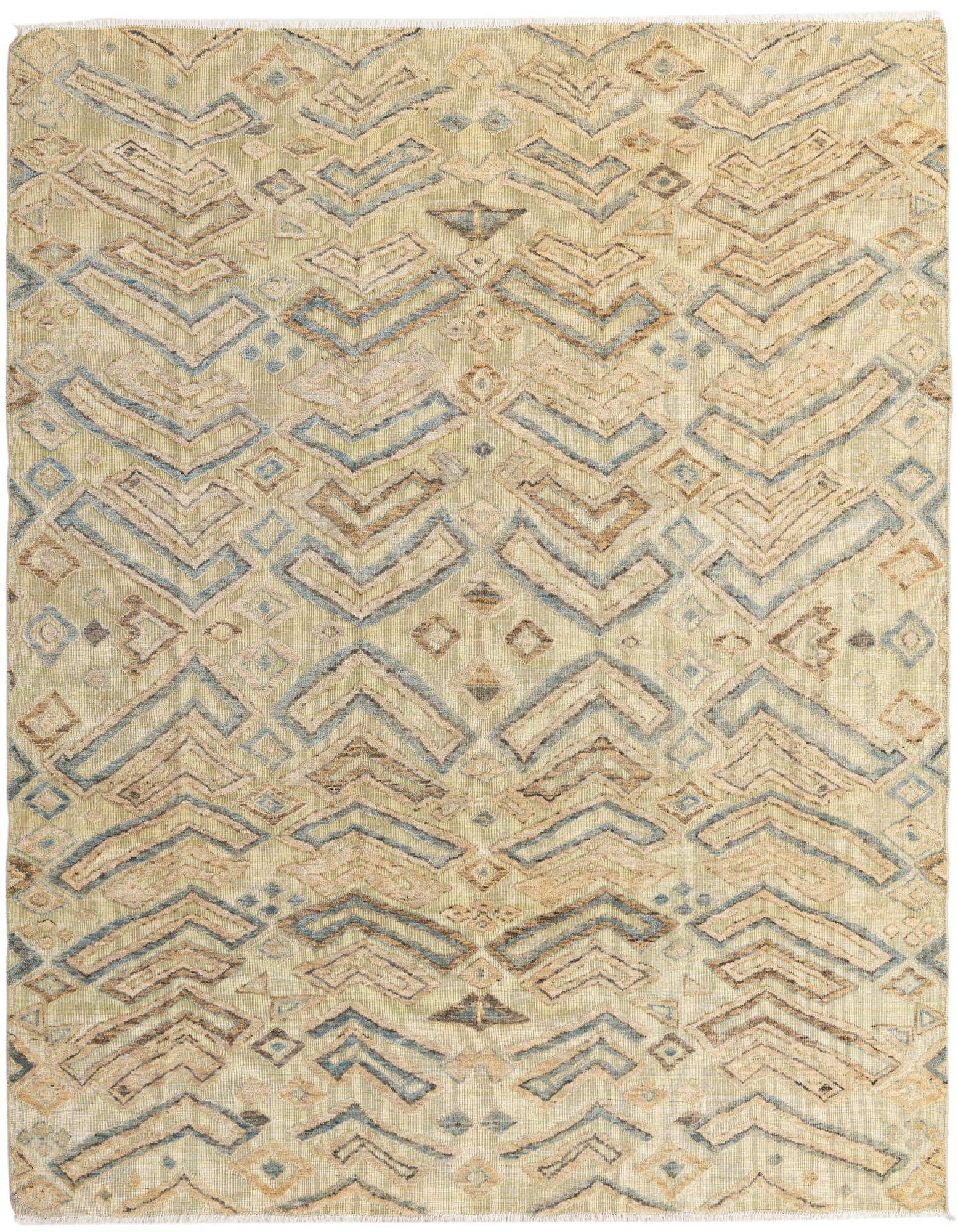 An 8x10 rectangular ivory wool rug with a modern abstract pattern in textured cream, blue, and brown tones.