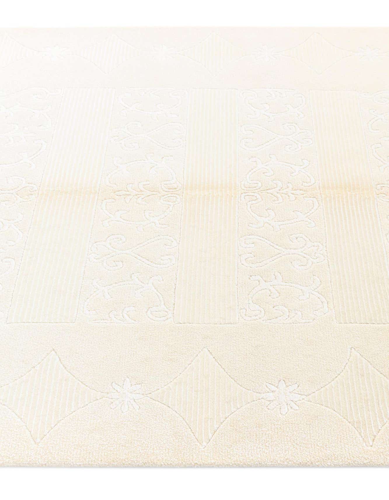 A 3x5 rectangular ivory modern Persian rug with a high pile, featuring subtle raised floral and striped patterns.