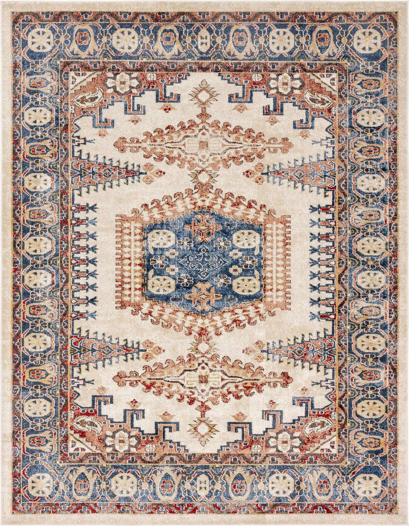 A 7x10 rectangular Eden Collection rug featuring an ivory field with a central blue medallion and tribal patterns in terracotta, blue, and cream.
