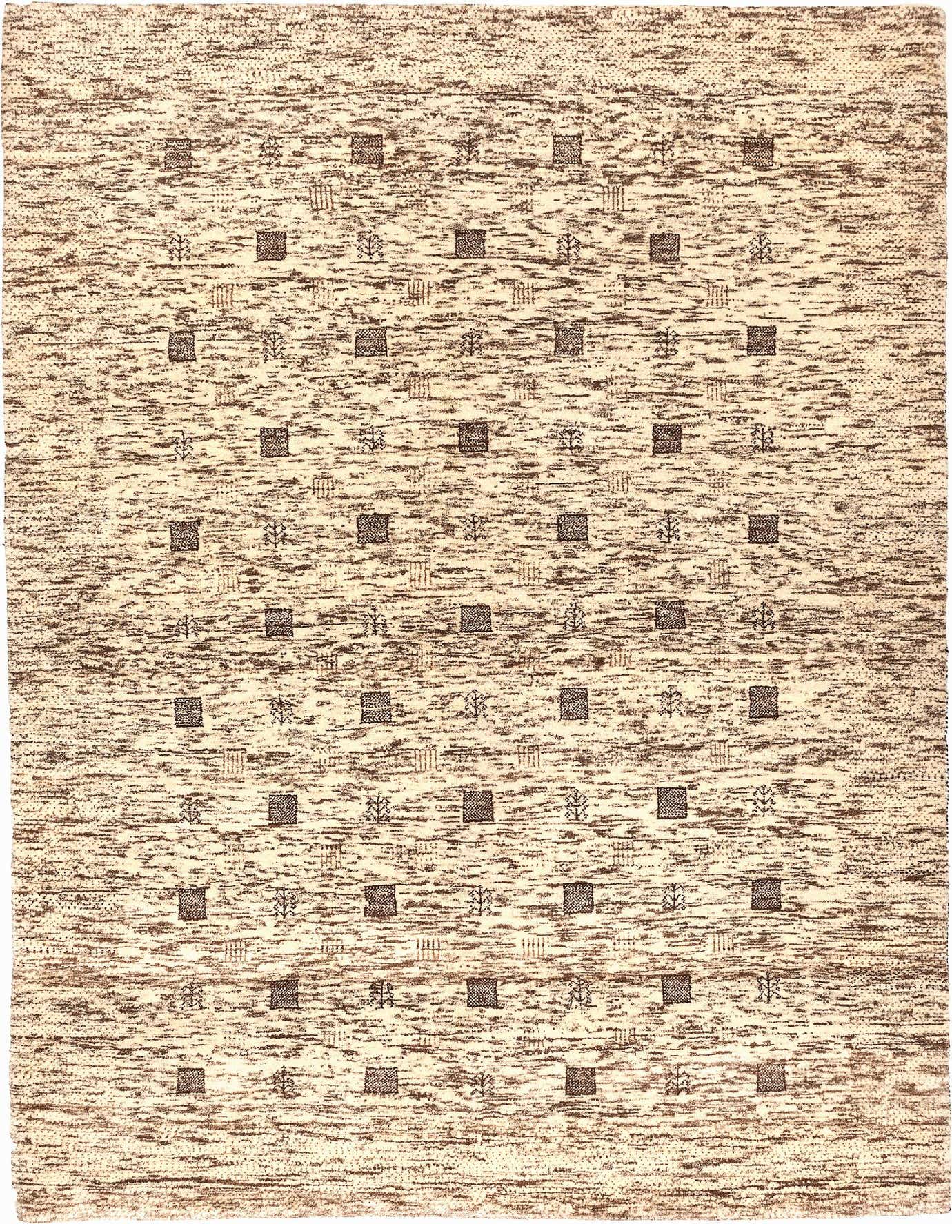 A 5x7 rectangular ivory and cream wool rug with a modern, abstract pattern of scattered brown squares and linear motifs.