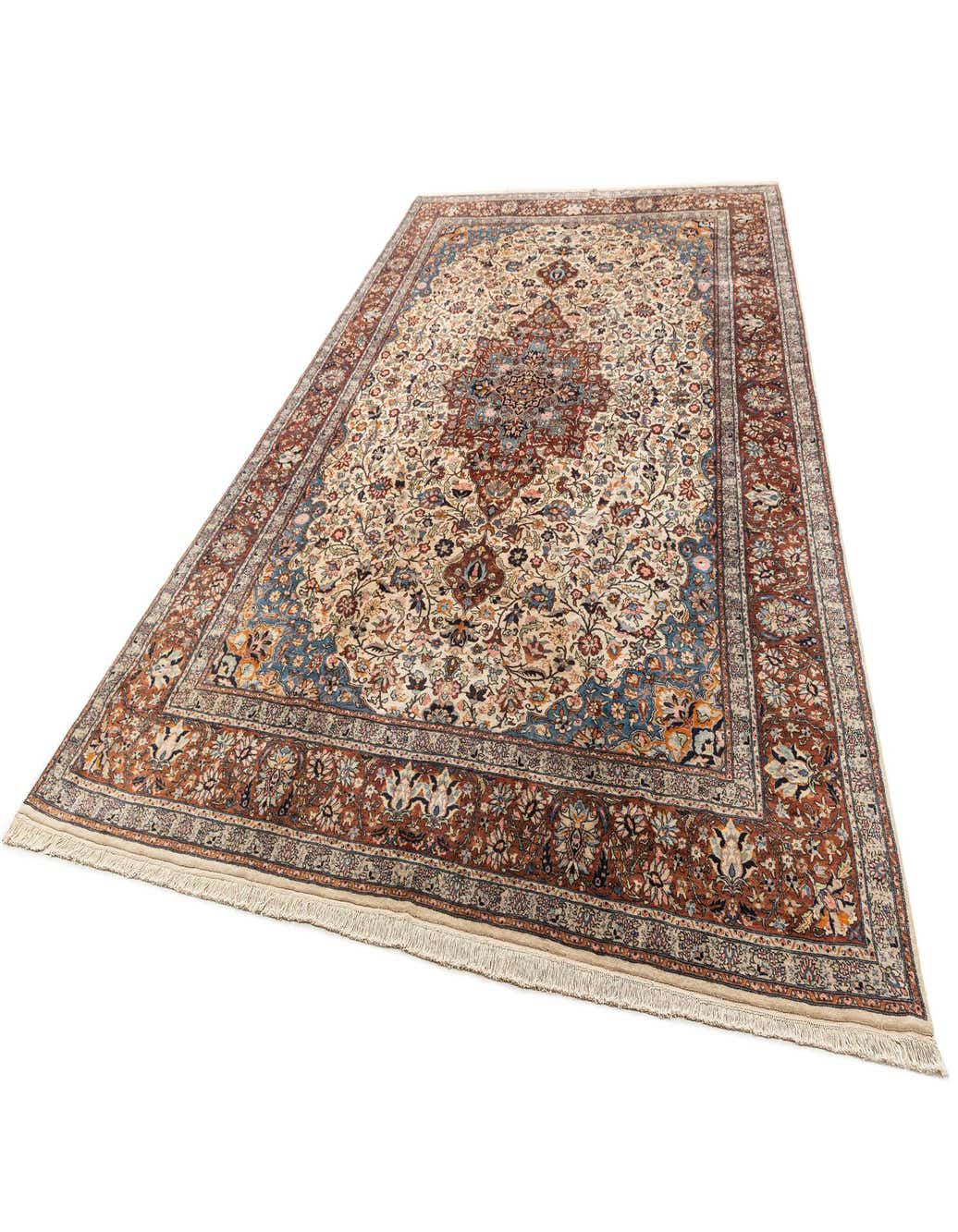 A large 10x13 rectangular ivory and cream area rug with intricate traditional floral patterns and a rust-colored border.