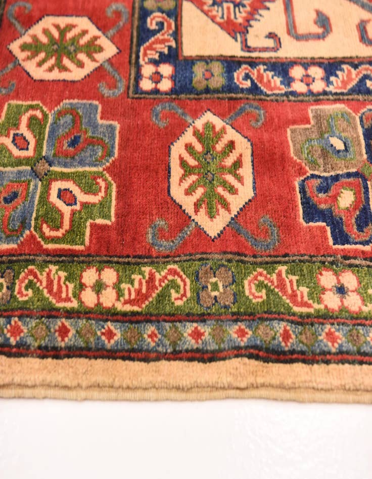 Detail image of  6' x 9'  Hand Knotted Kazak Rug