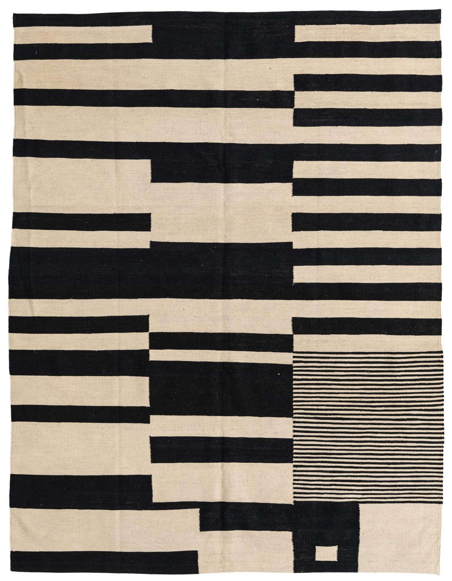 A 5x8 rectangular Kilim Modern rug with a bold abstract pattern of black and ivory stripes and blocks.
