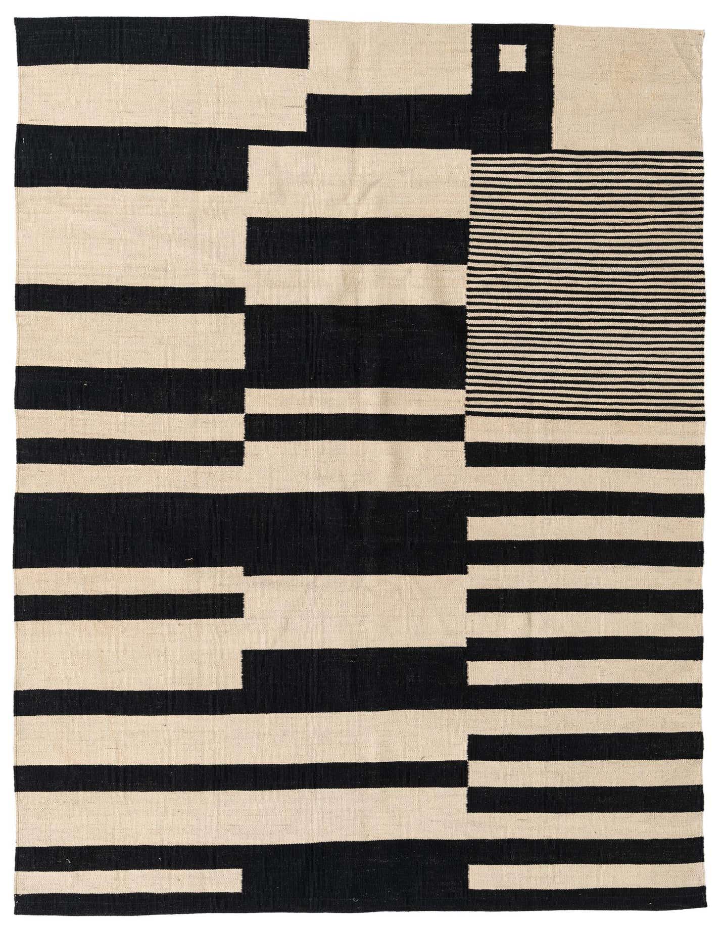 A 5x8 rectangular Kilim Modern rug with a bold ivory and black abstract tribal pattern, suitable for a living room.