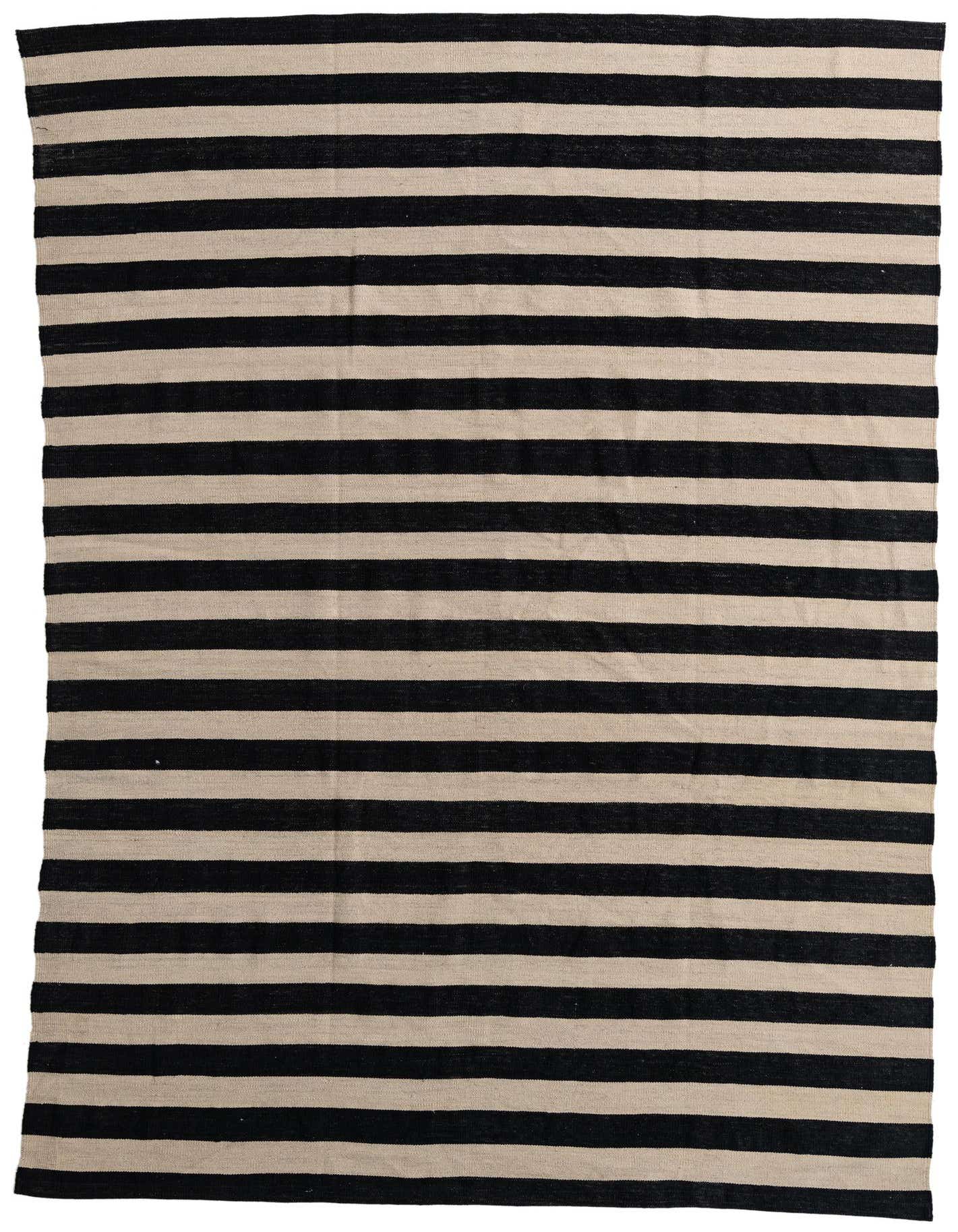 A 6x9 rectangular Kilim Modern rug with alternating horizontal stripes of black and ivory, showcasing its flatweave texture.