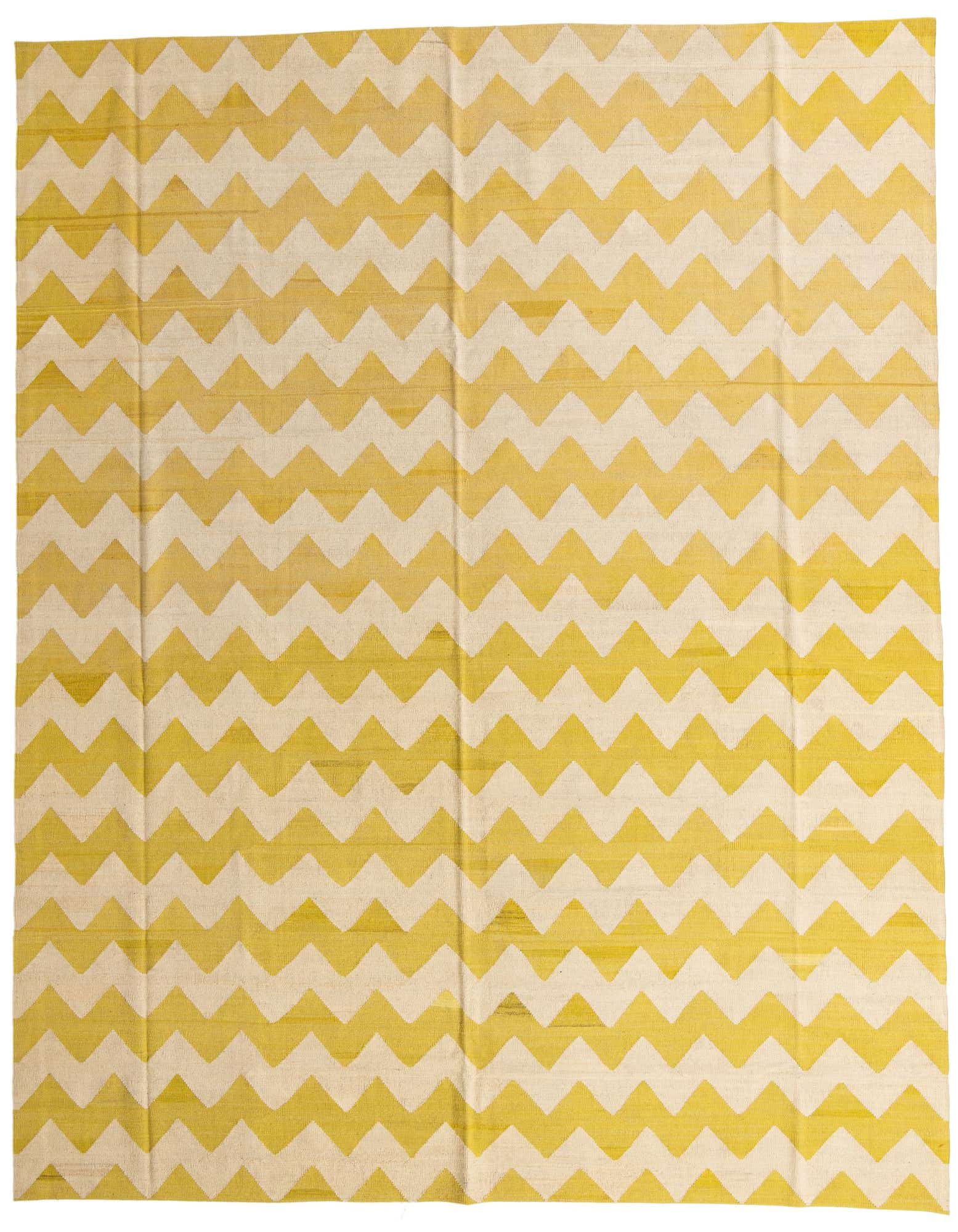 A 10x13 rectangular Kilim Modern rug with a bold ivory and yellow zigzag pattern, suitable for a living room.
