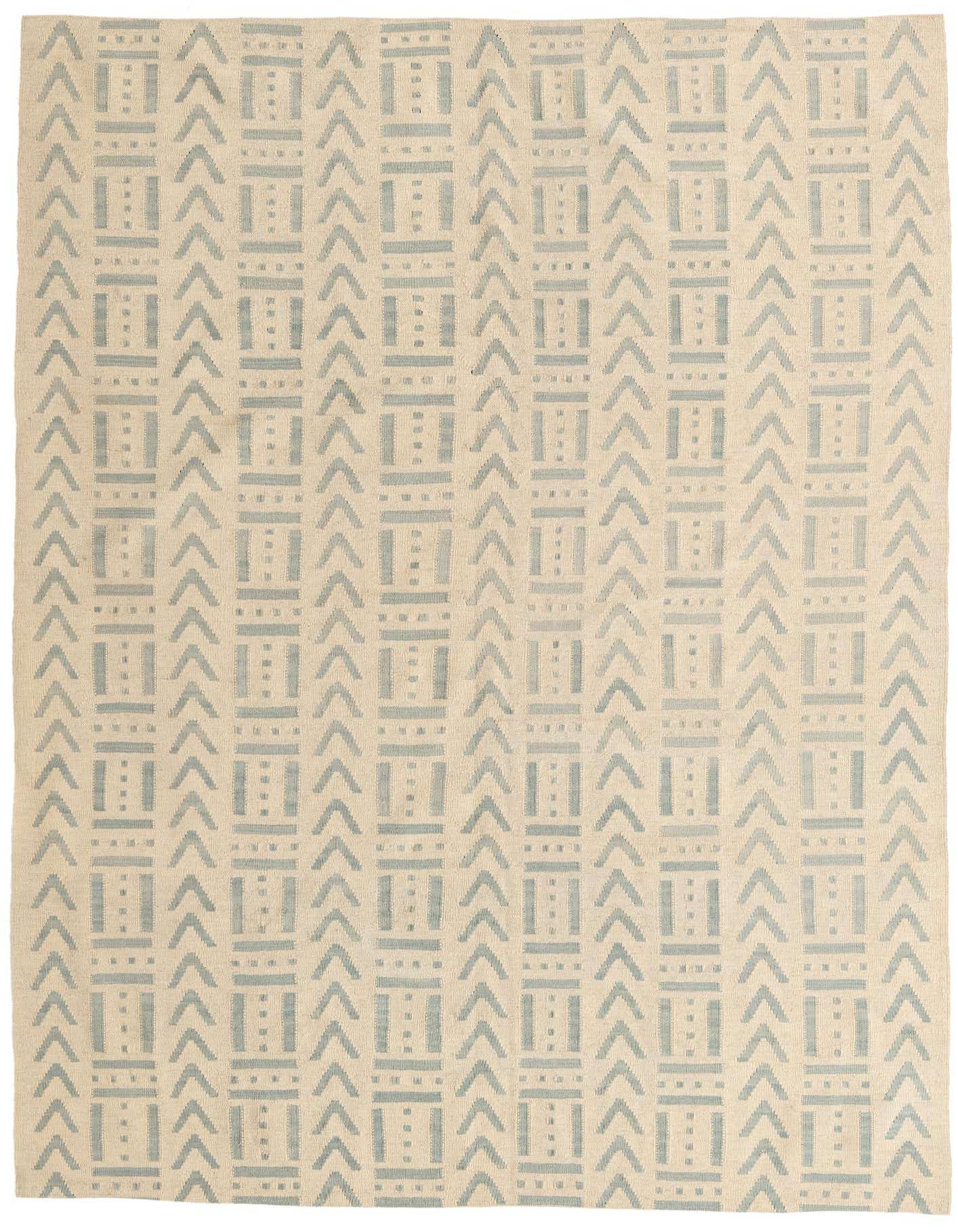 A 7x10 rectangular ivory wool rug with a repeating pattern of light blue tribal geometric shapes.