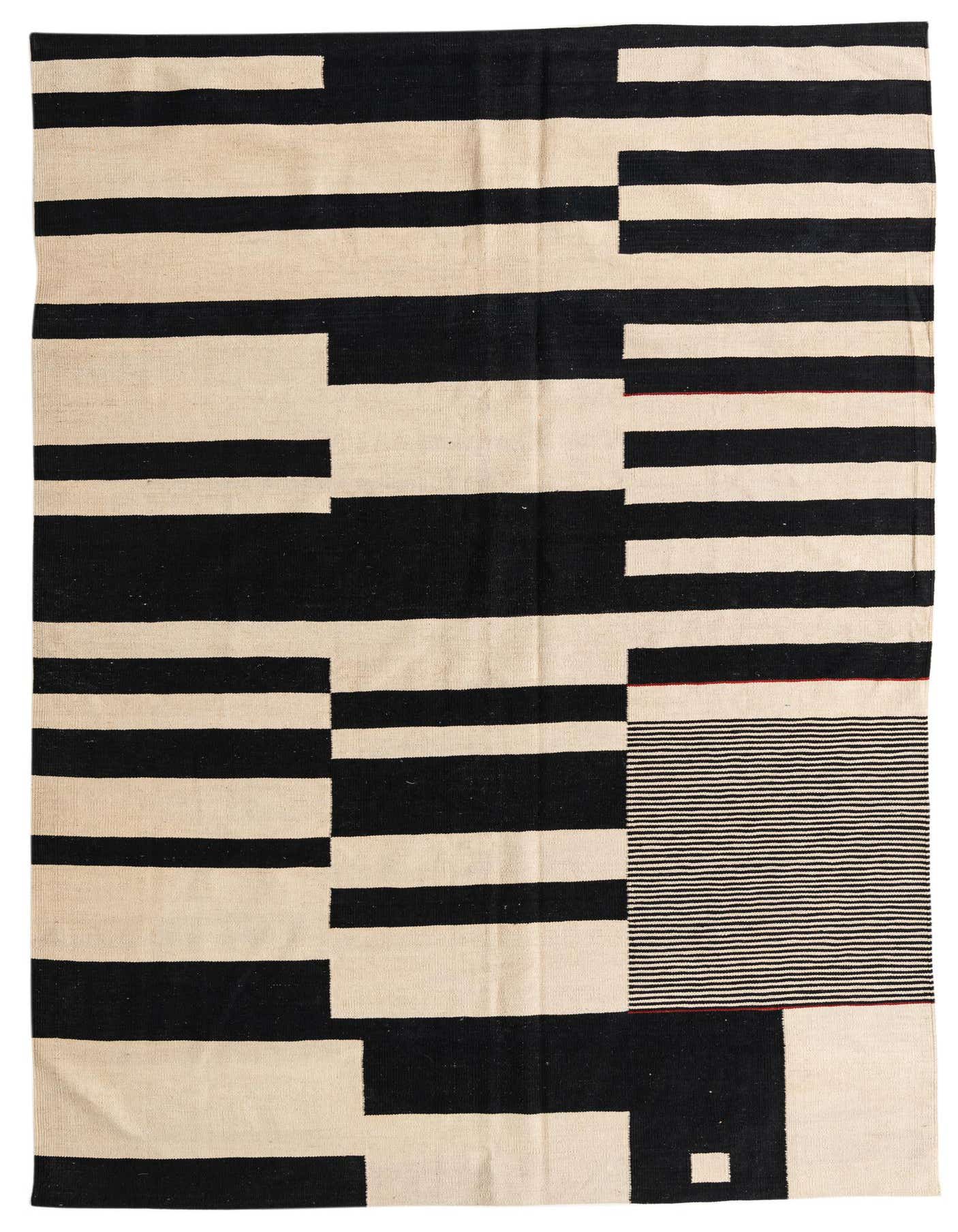 A 6x9 rectangular Kilim Modern rug with a bold black and ivory geometric tribal pattern, featuring horizontal stripes and a finely striped square.