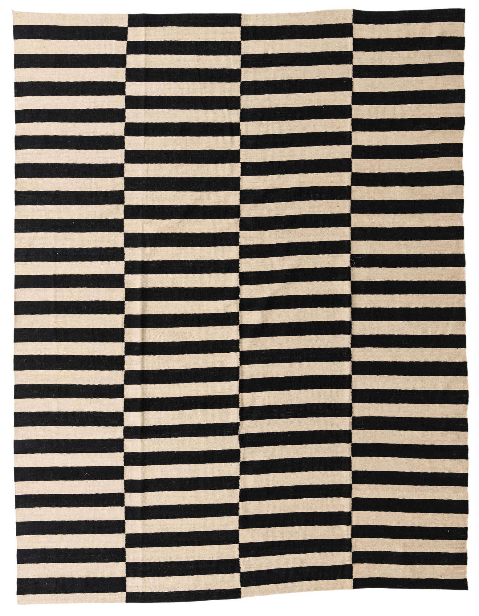 An 8x10 rectangular flatweave rug featuring a bold black and ivory striped pattern, perfect for a modern living room.